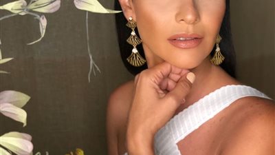 “طول عمري بموت في الأكل”.. بسمة تشارك جمهورها صورة من دولاب الذكريات