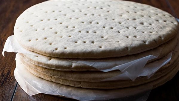 عمل عجينة البيتزا