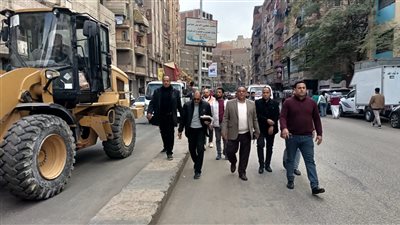 حملات لرفع تعديات المحال والباعة من الطريق العام بالوراق| صور 