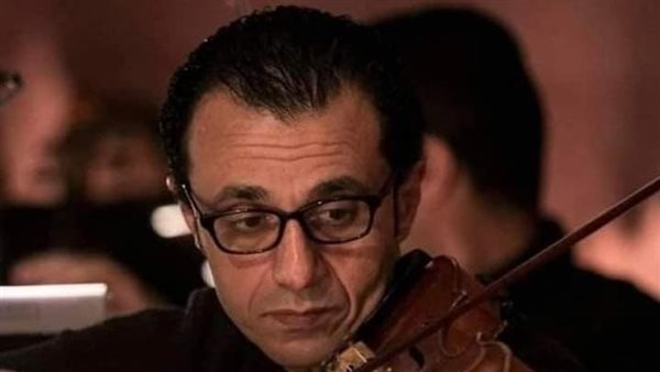  الموسيقي وعازف الكمان