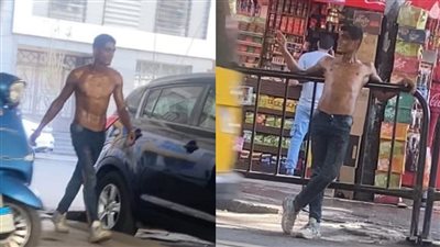 شاب شبه عارٍ يتجول بشوارع الزمالك في نهار رمضان