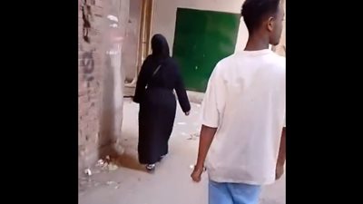 القبض على أجنبي تنمر على سيدة وصورها خلال سيرها في الجيزة 