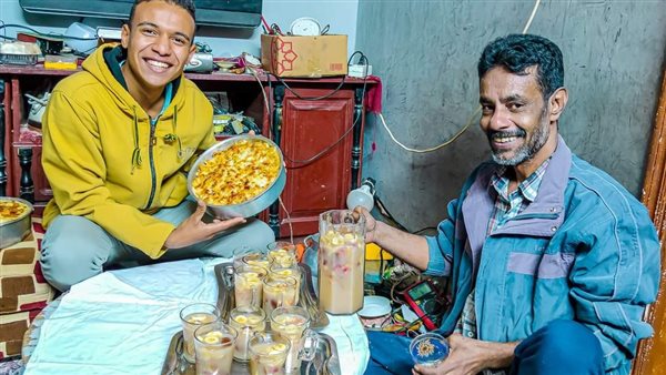 أب وابنه قبل رحيلهما