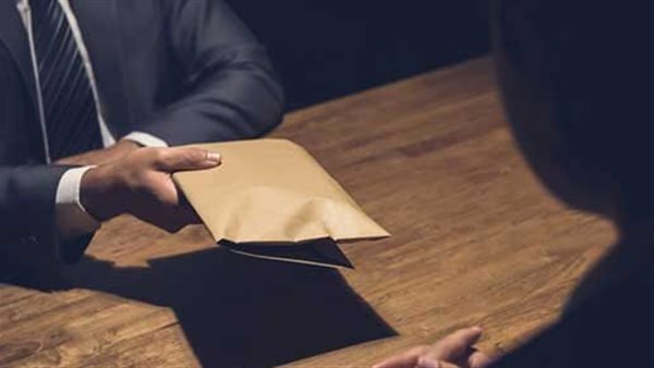 رشوة - تعبيرية