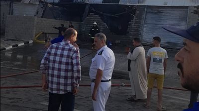 اندلاع حريق بمصنع تعبئة مواد غذائية بأسيوط | صور