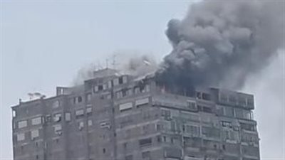 الحماية المدنية تسيطر على حريق أعلى برج سكني بمنطقة الزمالك | بث مباشر