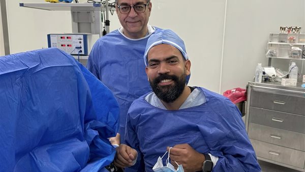 خالد عليش وزوجته