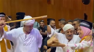 بالدبكة.. أب يرقص بالعصا على المزمار الصعيدي خلال حفل تخرج ابنته يثير الإعجاب على السوشيال ميديا