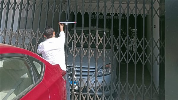 غلق وتشميع معرض سيارات