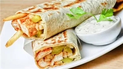 أسهل طريقة.. خطوات عمل صينية شاورما بالبطاطس