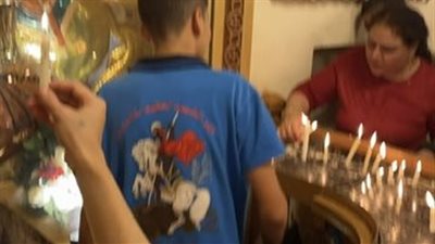 شموع وخراف.. نذور المحبين في احتفالات دير مارجرجس بالرزيقات