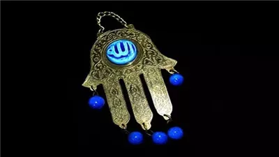 أستاذة تفسير بالأزهر: استخدام خمسة وخميسة لمنع الحسد خرافات