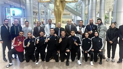 استقبال رسمي وجماهيري لبعثة الكاراتيه عقب العودة من إسبانيا