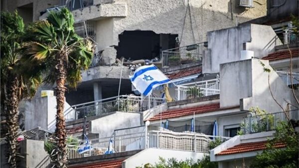 إحدى المباني المتضررة