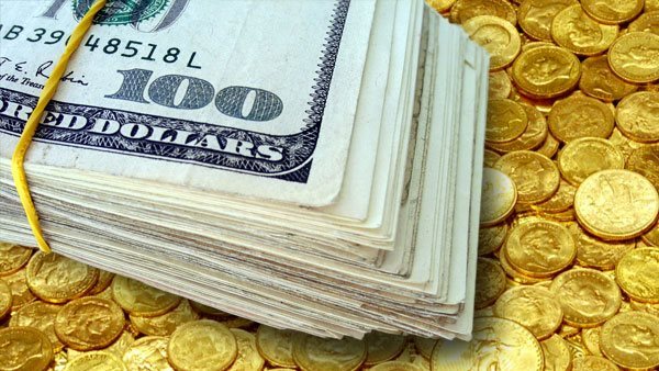 ذهب ودولارات- تعبيرية