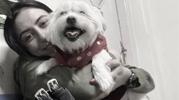 صاحبة الكلبة 