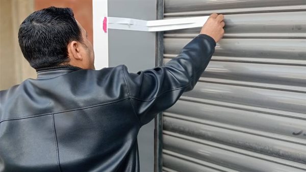 غلق وتشميع معرض سيارات