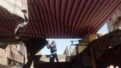 رفع الإشغالات وتنفيذ أعمال النظافة ومتابعة توافر السلع بالمعارض في أسوان