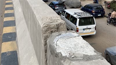 بعد نشر القاهرة 24.. القبض على عامل ثبت طبق دش أعلى محور كمال عامر بالعمرانية