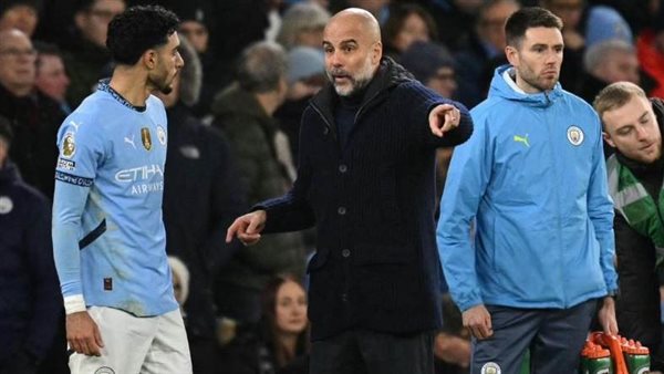 جوارديولا وعمر مرموش