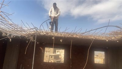 إزالة أدوار مخالفة بعقارات في منطقة كعابيش بحي الهرم | صور