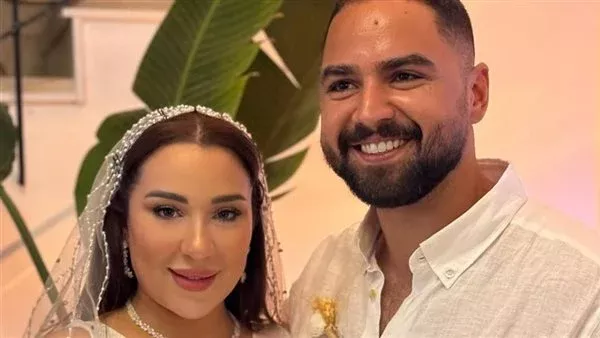 أسما شريف منير وزوجها