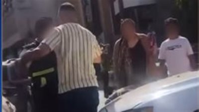 ضبط المتهم بالتعدي على رجل مرور في الشارع