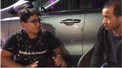 أول حوار مع الطفل المتهم بالتعدي على شرطي مرور: “بعتذر لوالدي اللي اتشحطط ورايا وكل الناس” (فيديو)