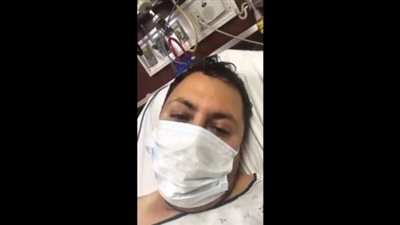 “ادعولي أنا بين إيد ربنا”.. شاب يوثق معاناته مع كورونا من داخل العناية المركزة (فيديو)