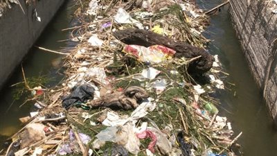 معاناة مزارعي طامية بالفيوم: بحر العيوج يتحول إلى مقلب نفايات يهدد 800 فدان بالبوار| صور