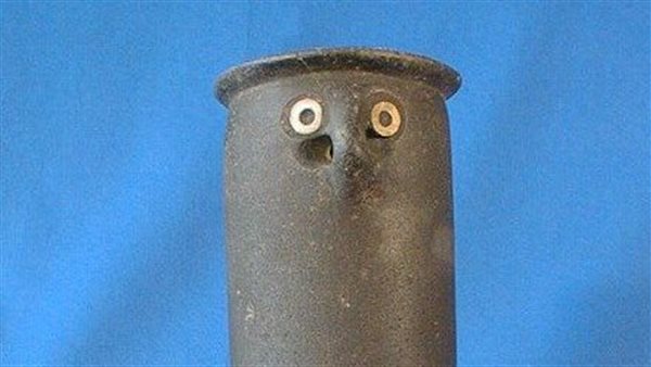  إناء نادر بوجه بشري