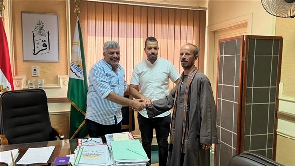 رئيس حي الدقي ومحرر