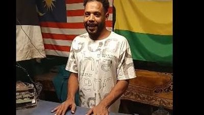 المحل مبقاش فيه شغل.. إكرامي من ذوي الهمم: بشتغل مكوجي وبصرف على أخويا المعاق ونفسي أصلح المكواة