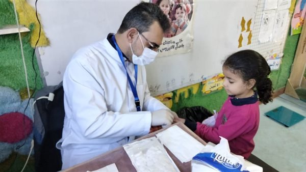 فحص طلاب المدارس