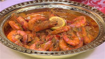 طريقة عمل الجمبري المتبل.. ابدأي بالخضار أولًا والزبدة في النهاية