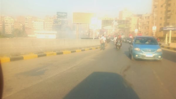 دخان بجوار طريق المحور