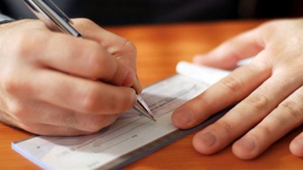 عقوبة الشيك بدون