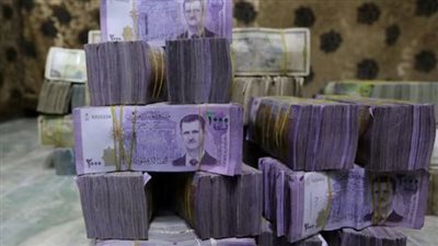 النقود السورية تحمل صورة بشار الأسد 