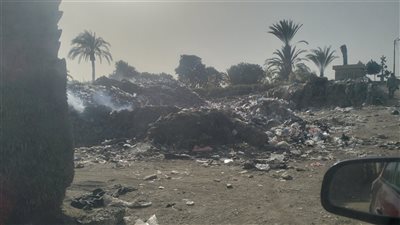 استغاثة أهالي ببا ببني سويف: مركز تجميع القمامة يهدد الصحة ويشوه محيط مزلقان السكة الحديد| صور