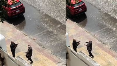 بعد تصدرهما التريند.. أول تعليق لمصور رقص صديقين تحت الأمطار بوسط البلد: كل الناس افتكرتهم زوج وزوجته