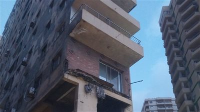 التحقيق في سقوط أجزاء من عقار بطريق الكورنيش بالإسكندرية
