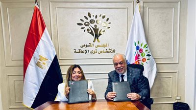 أشرف زكي والدكتورة إيمان كريم    