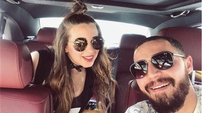 أسما شريف منير وزوجها في زيارة لمعرض الكتاب (صور)