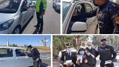 الشرطة توزع الورود على المواطنين احتفالًا بعيدها الـ69