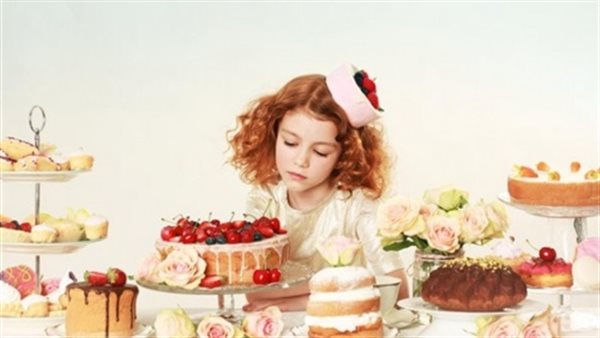تناول الأطفال الحلوى