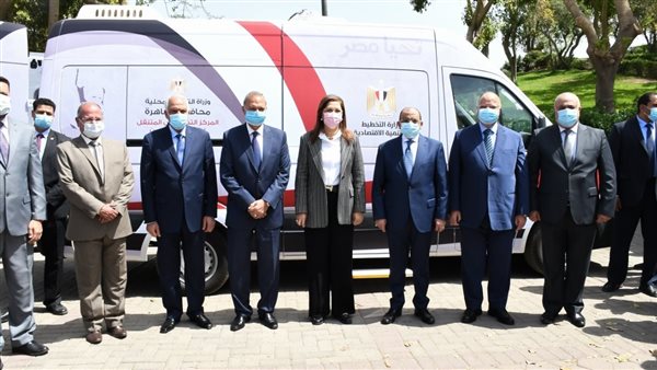 وزيرة التخطيط أثناء