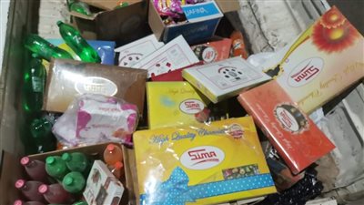 ضبط 825 زجاجة مواد غذائية منتهية الصلاحية في سوبر ماركت بالفيوم (صور)