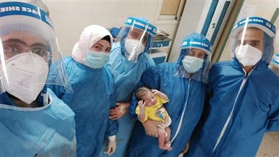 إجراء عملية ولادة قيصرية ناجحة لمصابة بكورونا في مستشفى الجامعة بسوهاج (صور)