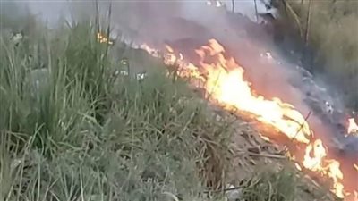 حريق في أرض فضاء بكورنيش النيل بحدائق حلوان