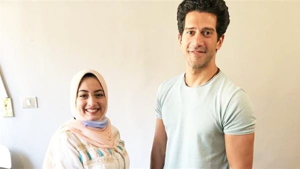 أحمد مجدي مع محررة